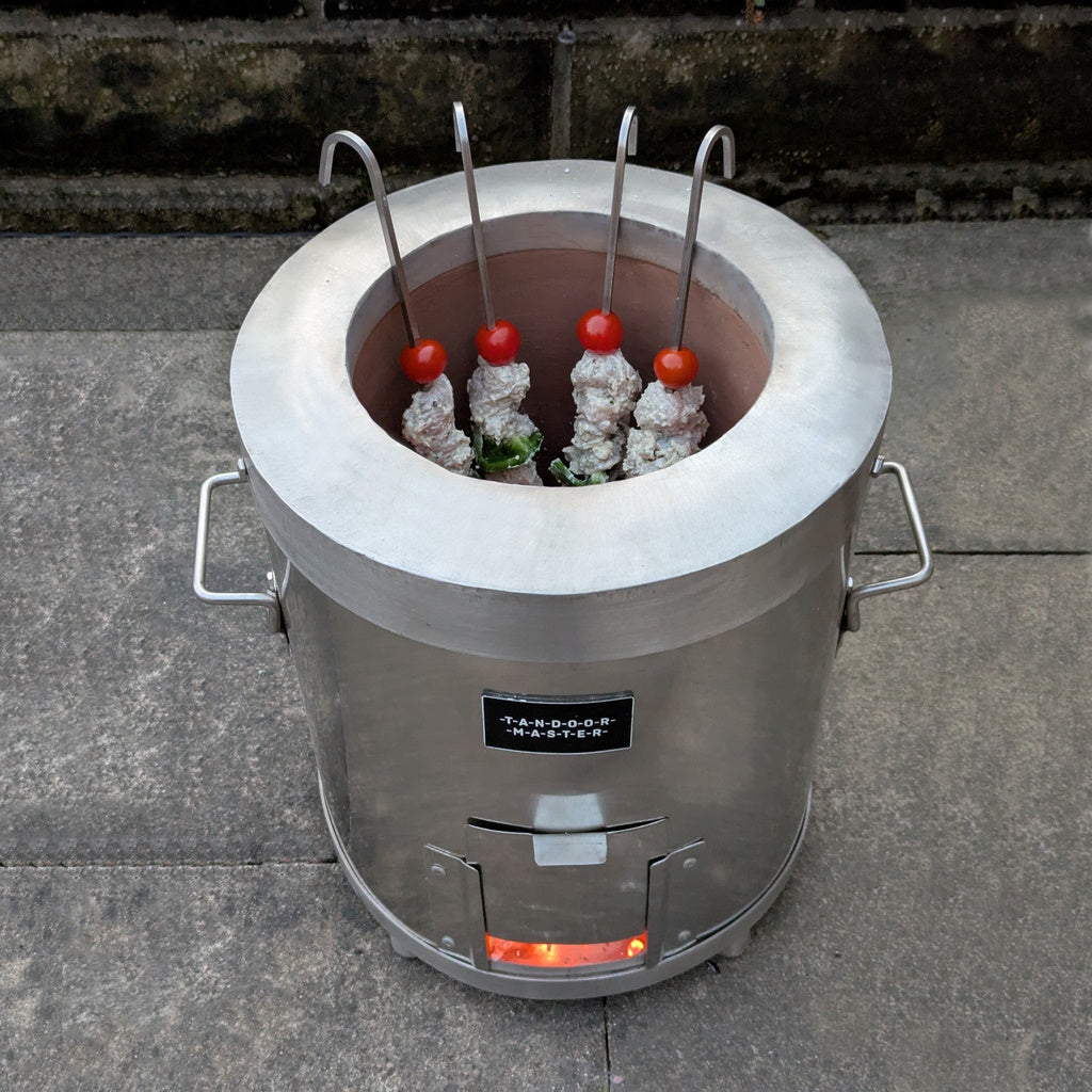 tandoori chicken in small tandoor