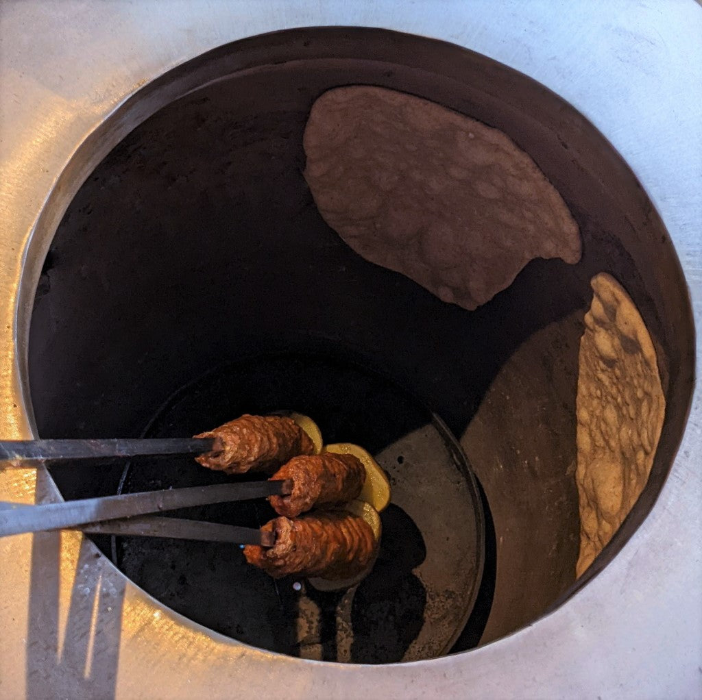 seekh kebabs and roti in gas tandoor